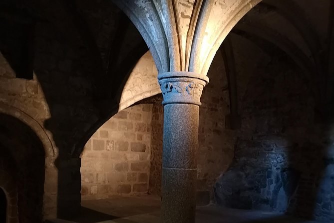 Round pillars and vaults in a crypt of the abbey on Mont-Saint-Michel